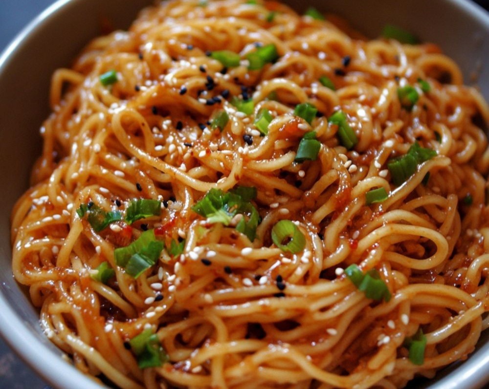 Yummy Cheesy Spicy Vegan Saucy Ramen Noodles serving