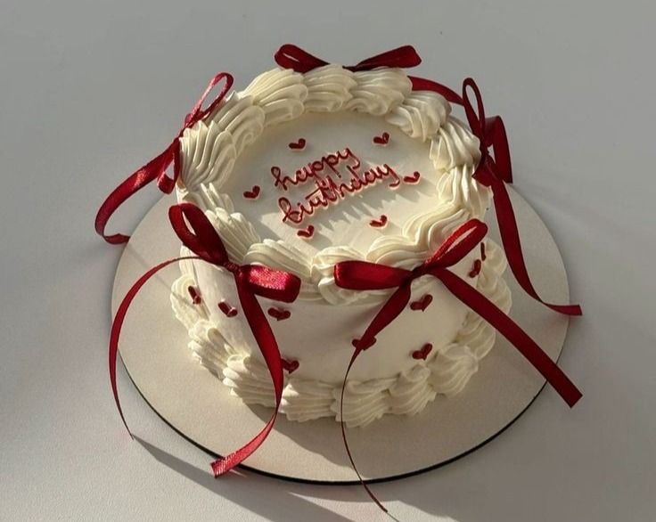 Vintage Red Bow Birthday Cake: Small Town Celebration Delight overview